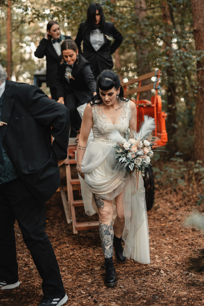 Amy-Ellen and Piere’s Rock n’ Roll Wedding in the forest with tractor entrance