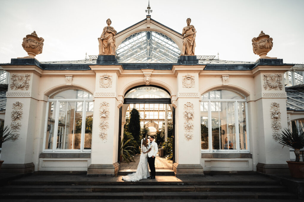 Sudanese wedding couple portraits inside Temperate House at Kew Gardens captured by a London wedding photographer