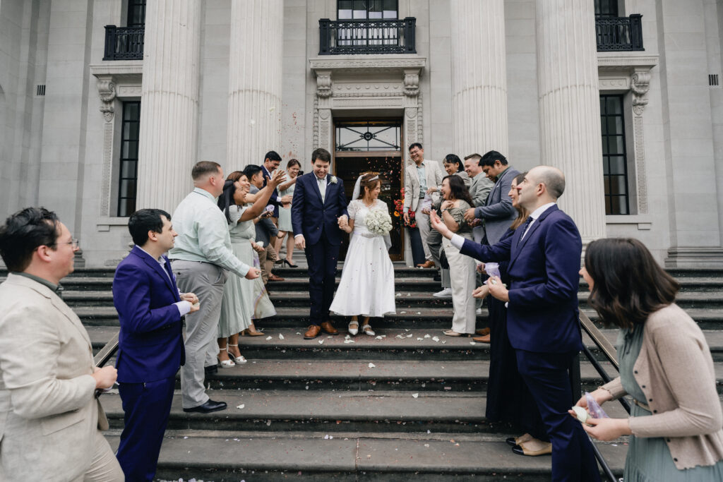 Bride and groom confetti exit at Marylebone Town Hall wedding