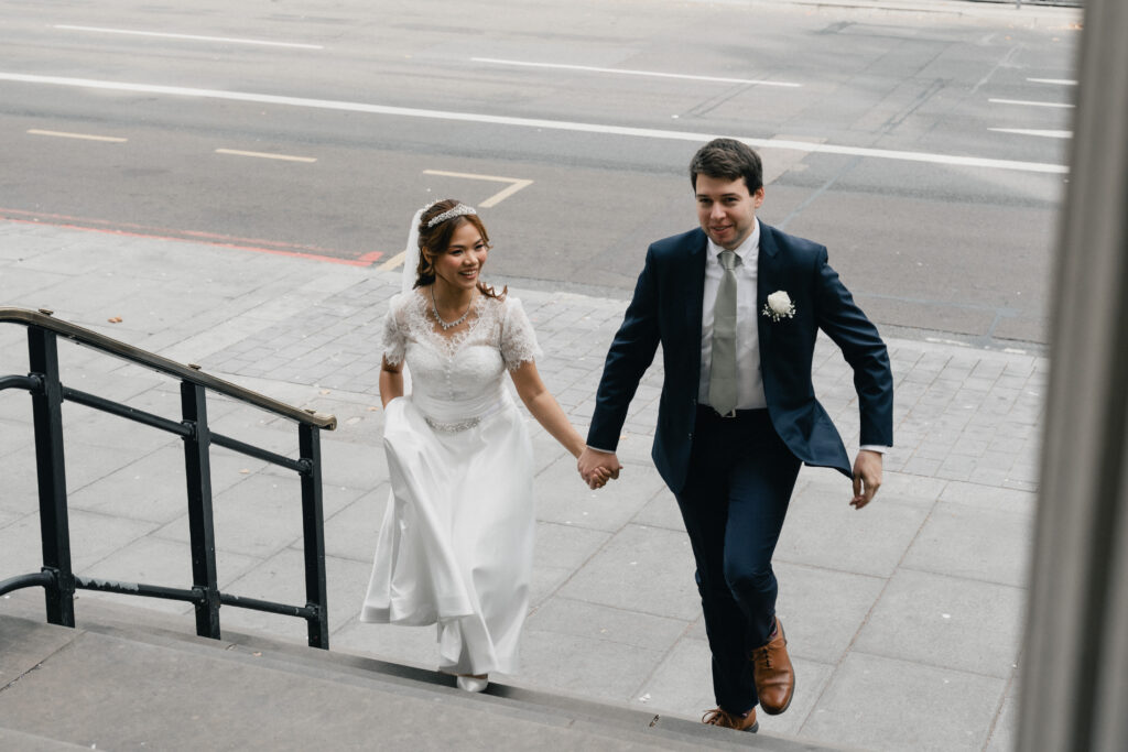 Marylebone Town Hall wedding photography of couple walking in London