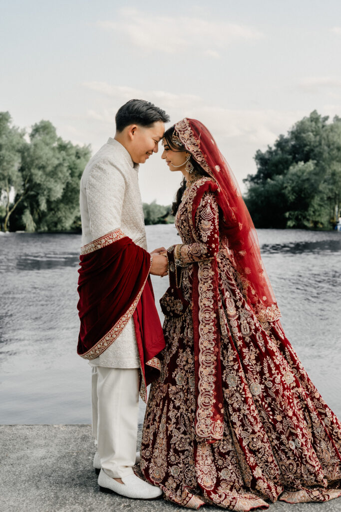 Luxury fusion wedding couple portraits by the water in Cambridge