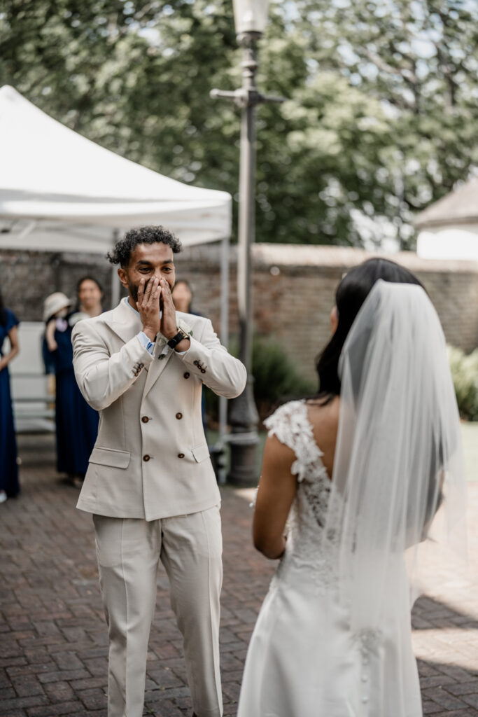 bride and groom first look reveal
