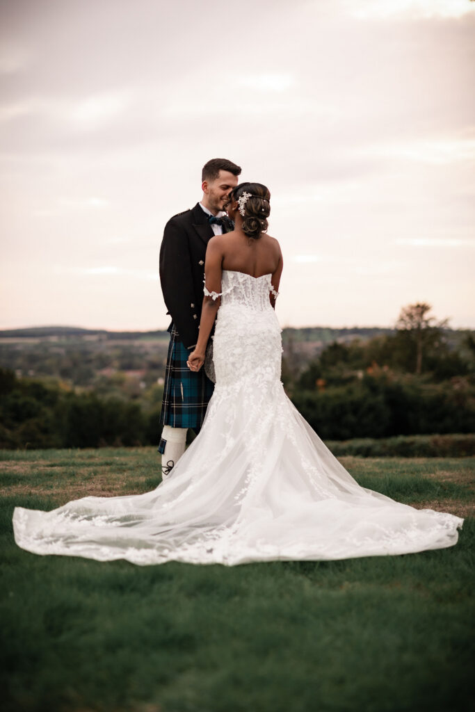 Bride and groom portraits in Hedsor House gardens