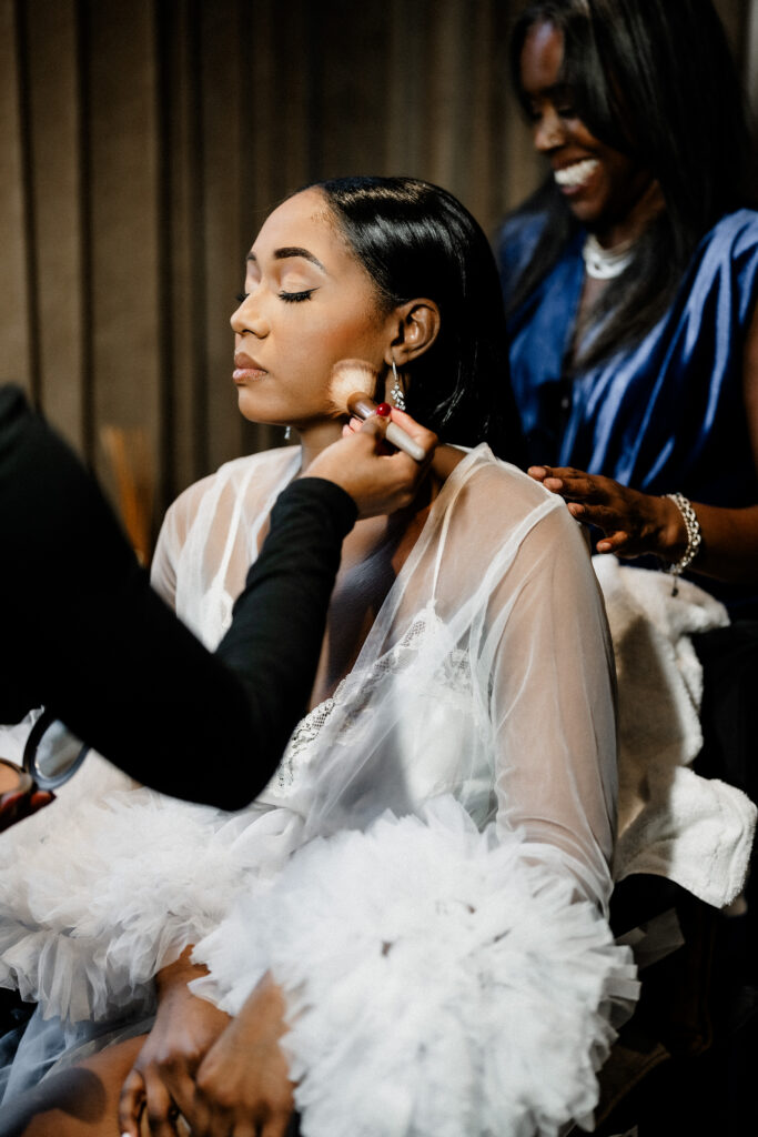 Bride getting ready during wedding photography timeline