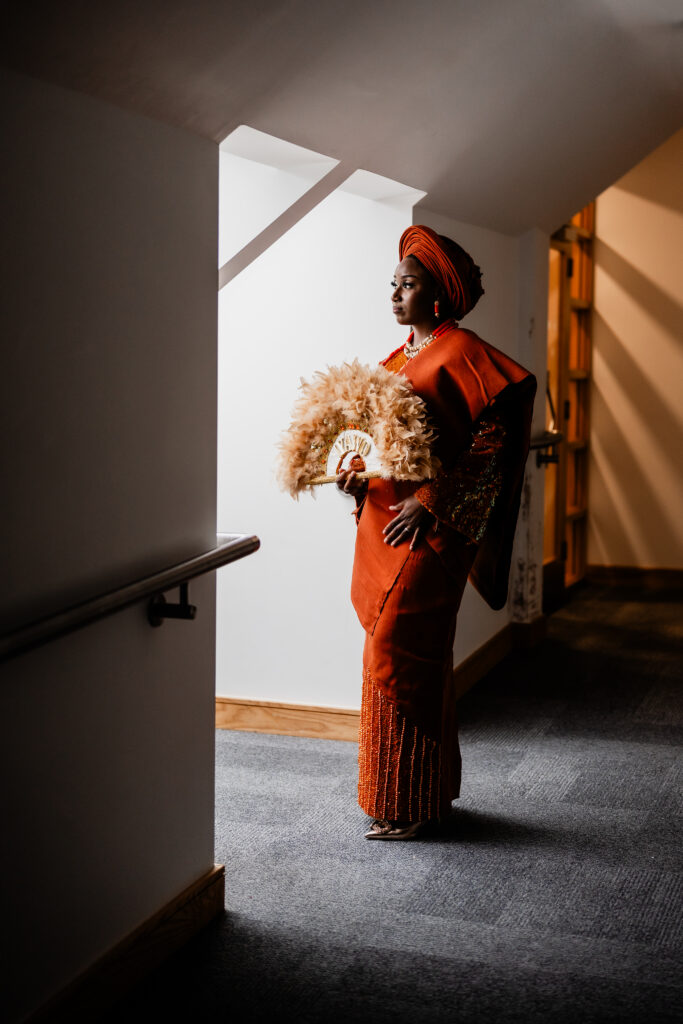 Bride wearing gele at Nigerian engagement ceremony